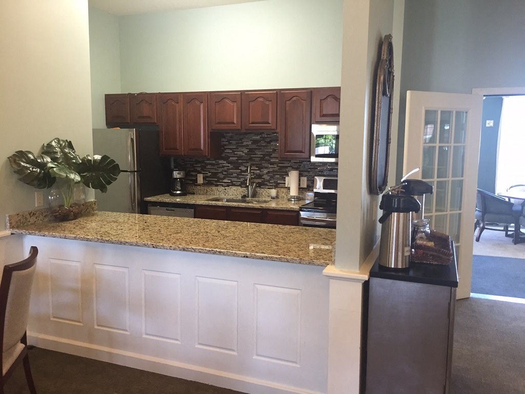 Gourmet Kitchens with Islands, Caesarstone Countertops, and Decorative Backsplash at Nicolet Highlands Apartments 55+, Wisconsin, 54115